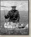 a Japanese-American fisherman with his catch